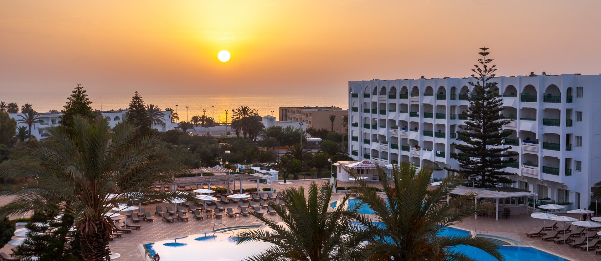 Hotel pool and sunset - JetSun Holidays